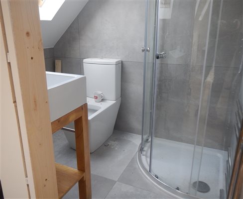 Bathroom tiled and nearing completion in Isleworth