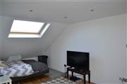 L shaped dormer into 2 bedrooms and bathroom all finished and decorated in Ealing