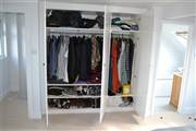 Bespoke wardrobe in loft space bedroom in Beaumont Road Chiswick W4