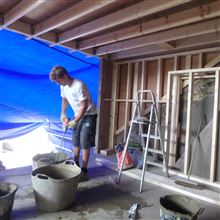 Bill mixing up the cement for dormer loft conversion in Chiswick W4