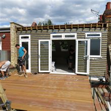 Fitting the decking for the roof terrance at Acton W3