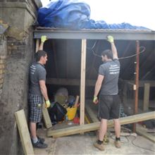 Fitting the ridge steel at the Ealing loft conversion