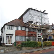 Tin hat scaffolding was needed on this loft conversion and reroofing job in Cheam.