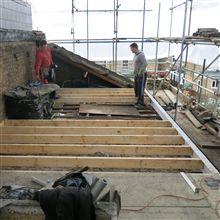 Hayde and Billy fitting the floor joists at our L shaped dormer conversion in Coldershaw Road, Ealing, W13.