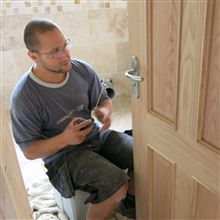 Aron here hanging the bathroom door in Isleworth