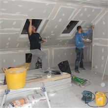Dorin and Stefan tape and jointing at this dormer loft conversion in Brentford.