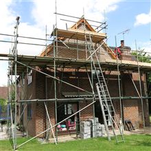 Scaffolding to brick up a gable end during a loft conversion