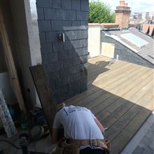 Nathan finishing the boards for the roof terrace in Chiswick W4