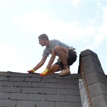 Nathan from Ash Island Lofts stripping a roof in Shepherds Bush W12