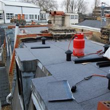 Making good use of our scaffolding as the neighbour here got us to redo their flat roof.