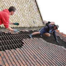 There was a lot of tiles to come off before we could start the loft conversion build at Acton W3.