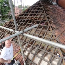 Roof tiles being taken off