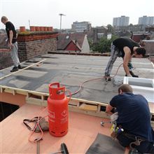 Torch on flat roofing in Wimbledon.