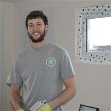 Dylan from Ash Island Lofts fitting white PVC window to L Shaped Dormer in Ealing