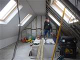Plasterboard being fitted in Shepherds Bush