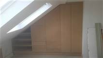Bespoke cupboards in L shaped dormer conversion Acton W3