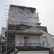 Tin hat scaffolding in Ealing for L Shaped dormer loft conversion into 2 bedrooms and bathroom by the loft conversion specialists Ash Island Lofts Limited